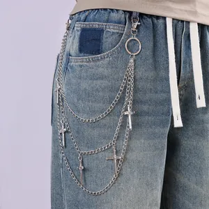 Multi-layer silver cross pendant pants chain on blue denim jeans in hip hop style