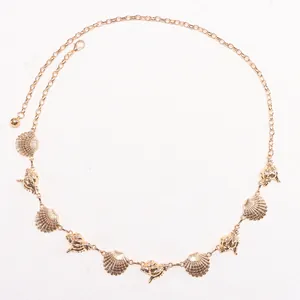 Bohemian gold beach belly chain with metal starfish and seashell charms for women