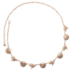 Bohemian gold beach belly chain featuring metal starfish and seashell pendant charms