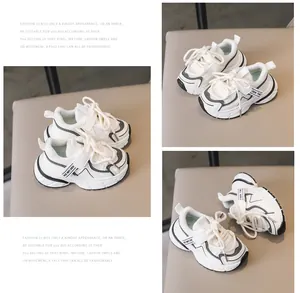 Detailed close-up of cream children sneakers with breathable mesh and thick anti-slip sole