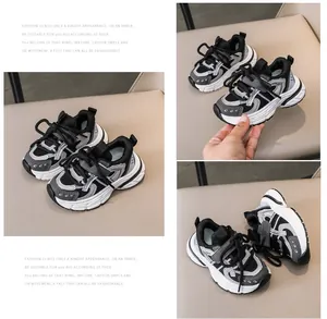 Detail of kids sporty sneakers featuring retro mesh patchwork and thick non-slip white soles