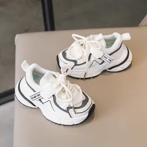 Close-up of kids sports sneakers with breathable mesh and hook-and-loop straps