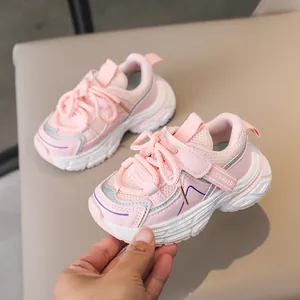 Detail of pink toddler sneaker featuring breathable mesh and 3-stripes ribbon detail