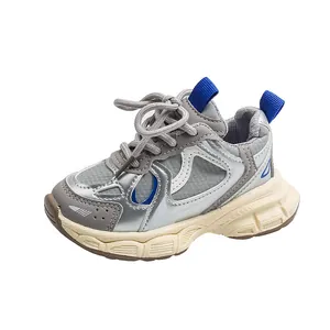 Children's silver and grey athletic sneakers with breathable mesh and anti-slip thick soles
