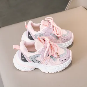 Detailed view of pink breathable mesh sneakers with thick EVA sole and velcro closure