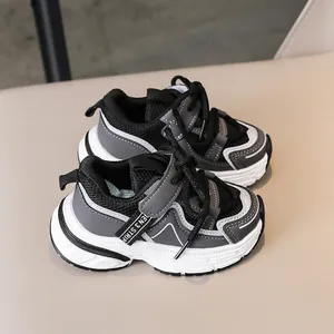 Detailed macro view of kids sneakers featuring breathable mesh and Velcro strap closure