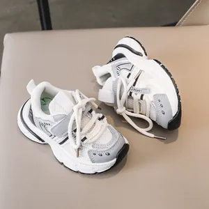 Detail view of children's sneaker with breathable white leather and secure velcro strap