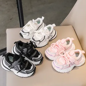 Kids breathable mesh running shoes in beige, black and pink with velcro straps