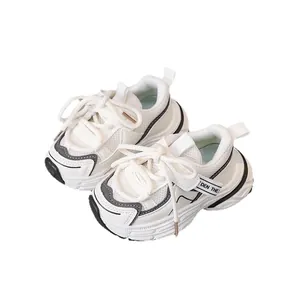 White breathable mesh sneakers for children with grey accents and soft running soles
