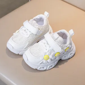 Girls white floral sneakers with LED lights and daisy appliqués on faux leather mesh