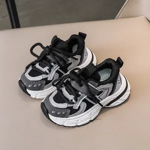 Kids breathable mesh sneakers in black and grey with thick non-slip soles for casual sport