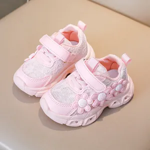Pink floral light-up sneakers for girls with lace mesh and velcro strap closure