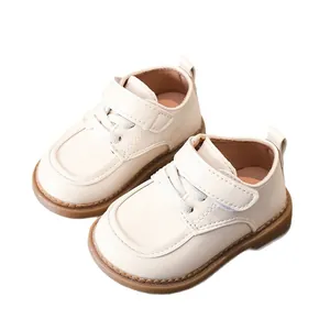 Toddler cream faux leather walking shoes with velcro strap and non-slip rubber soles