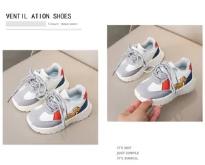 Detail of breathable multi-color patchwork sneakers for kids with thick white soles