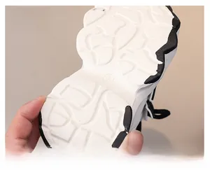 Close-up of non-slip rubber outsole for kids sneakers with durable grip texture