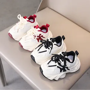 Detailed view of children's breathable mesh sneakers in red and black color options