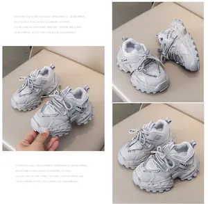 Detail of grey chunky sneakers for kids featuring breathable mesh and anti-slip thick soles