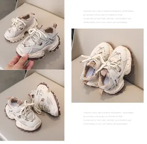 Detailed macro view of kids mesh dad sneakers with non-slip chunky sole and breathable fabric