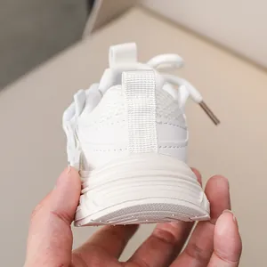Close-up of white children sneaker heel featuring breathable mesh and anti-slip thick sole