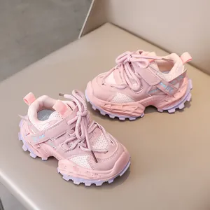 Top view of pink kids sports sneakers featuring breathable mesh and Velcro straps
