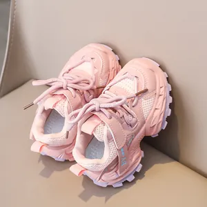 Detailed top view of girls breathable pink mesh sneakers with velcro and lace-up closure