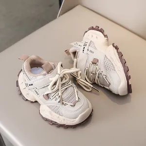 Detail of kids chunky sneaker showing the breathable mesh upper and velcro strap design