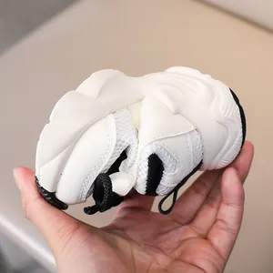Detail showing the flexible soft sole and breathable mesh of kids' sports sneakers
