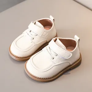Toddler cream white faux leather shoes with non-slip rubber soles and velcro straps