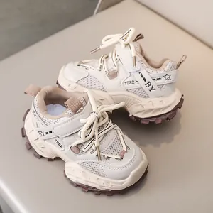 Detail shot of breathable mesh and synthetic leather upper on kids chunky sneakers