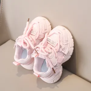 Breathable pink girls' sports sneakers with mesh paneling and cute bow decorative details