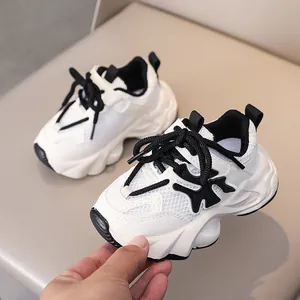 Breathable mesh children's sneakers with chunky soft soles in beige and black