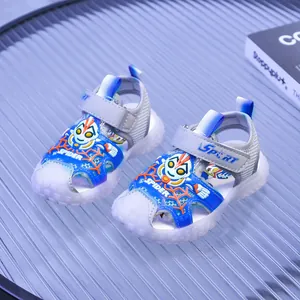Blue LED kids sports sandals with Ultraman design, closed-toe non-slip beach footwear