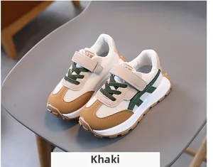Detailed view of kids breathable khaki sneakers with mesh panels and velcro closure