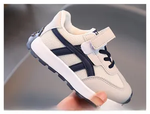 Detail view of breathable mesh kids sneakers with secure velcro strap and cushioned soles