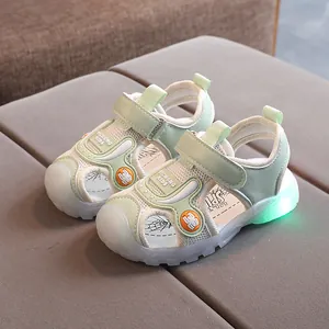 Mint green kids light-up sandals with mesh upper, toe protection and LED glowing soles