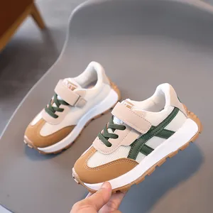 Kids' retro running shoes with mesh fabric, non-slip rubber soles, and velcro straps
