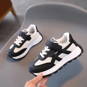Kids black and white breathable mesh sneakers with velcro strap and non-slip rubber sole