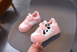 Close-up of pink toddler sneakers with 3D panda design and easy velcro strap