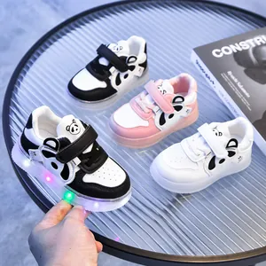 Detail of LED light-up panda toddler shoes with non-slip soft soles and velcro straps