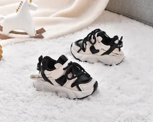 Detail of warm plush lining and velcro strap on kids' fleece-lined chunky sneakers