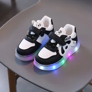 Kids panda sneakers with LED light-up soles and velcro straps for toddlers
