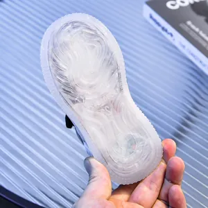 Detailed view of non-slip wavy rubber outsole on toddler LED glowing sneakers