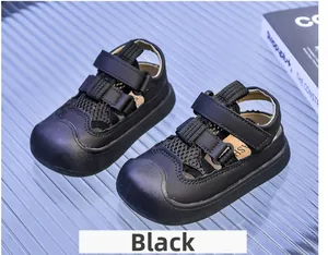 Detail of black breathable mesh children sandals with dual hook-and-loop straps