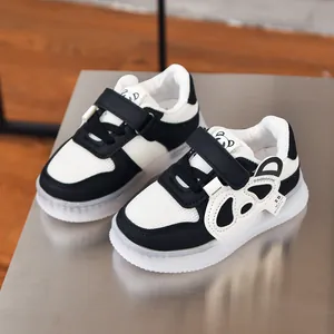 Detail of baby panda sneakers with breathable mesh, synthetic leather and non-slip sole