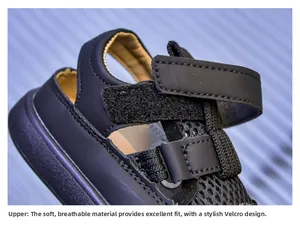 Detail of kids black beach sandals featuring breathable mesh and adjustable hook-and-loop strap