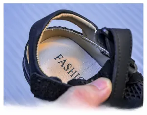 Detail of soft breathable inner lining and cushioned insole of kids mesh sandals