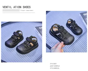 Detail of kids black breathable mesh sandals with protective toe cap and velcro straps