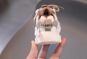 Close-up of children sneakers heel featuring fleece lining and Fashion lettering detail