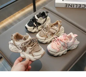 Detail showing lightweight breathable mesh fabric and hook-and-loop closure on kids' sneakers