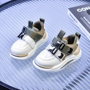 Kids color-block faux leather sneakers with double buckle closure and cushioned thick sole